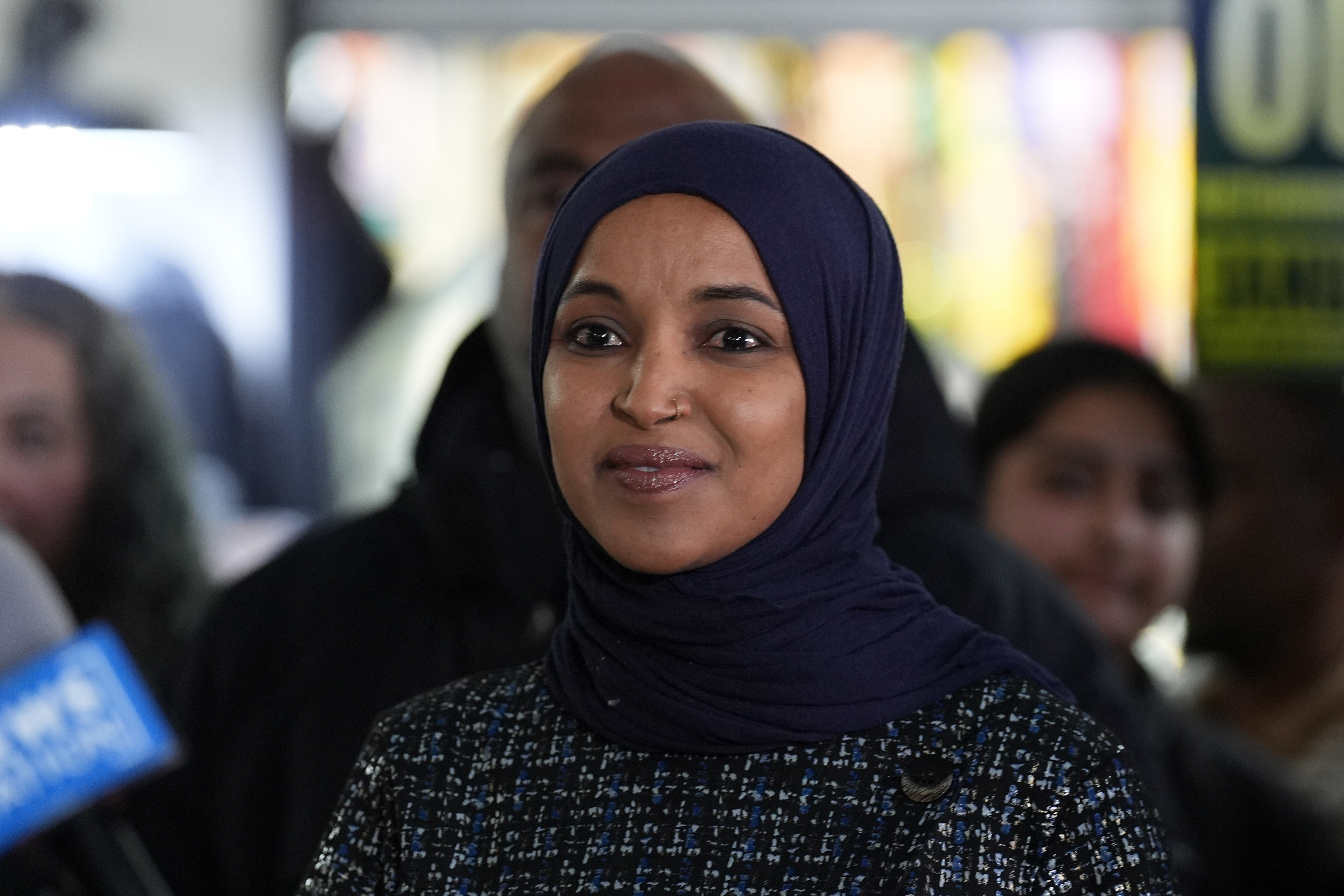 Rep. Ilhan Omar, D-Minn., stands during a press conference on Wednesday, Jan. 28, 2026, in Minneapolis. 