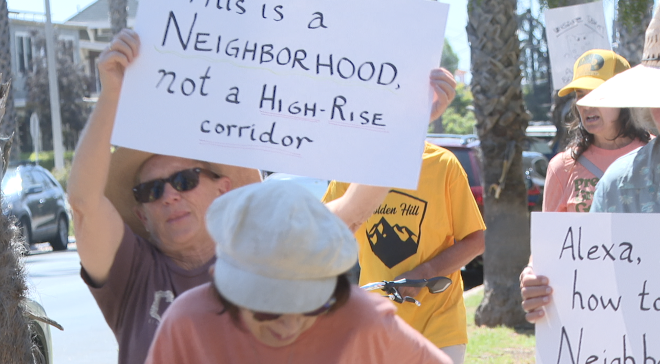 Neighbors marching on 28th street on Sunday. 
