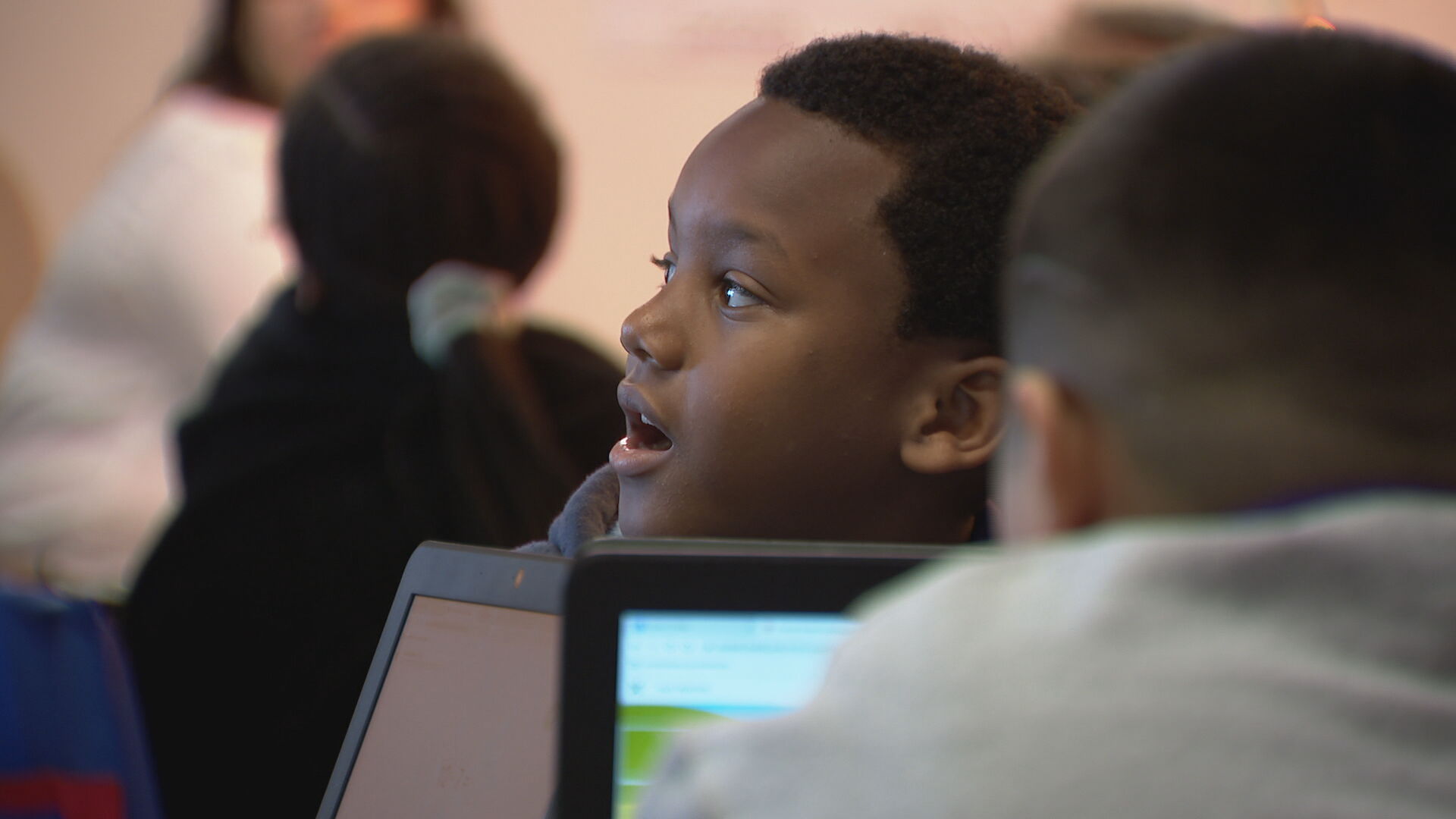 schoolchild reacts with wonder
