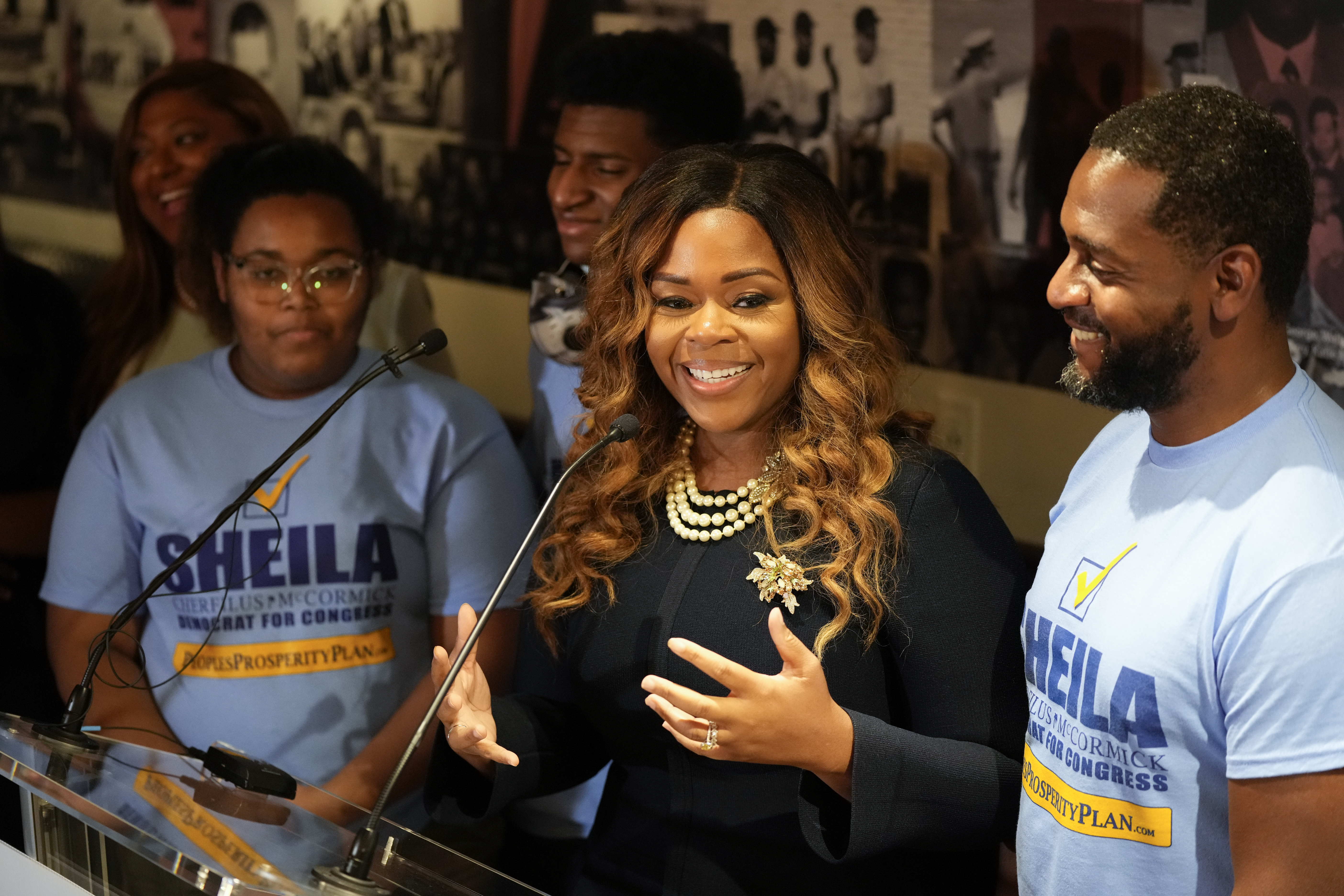 Sheila Cherfilus-McCormick with husband and children at election night party, Jan. 11, 2022