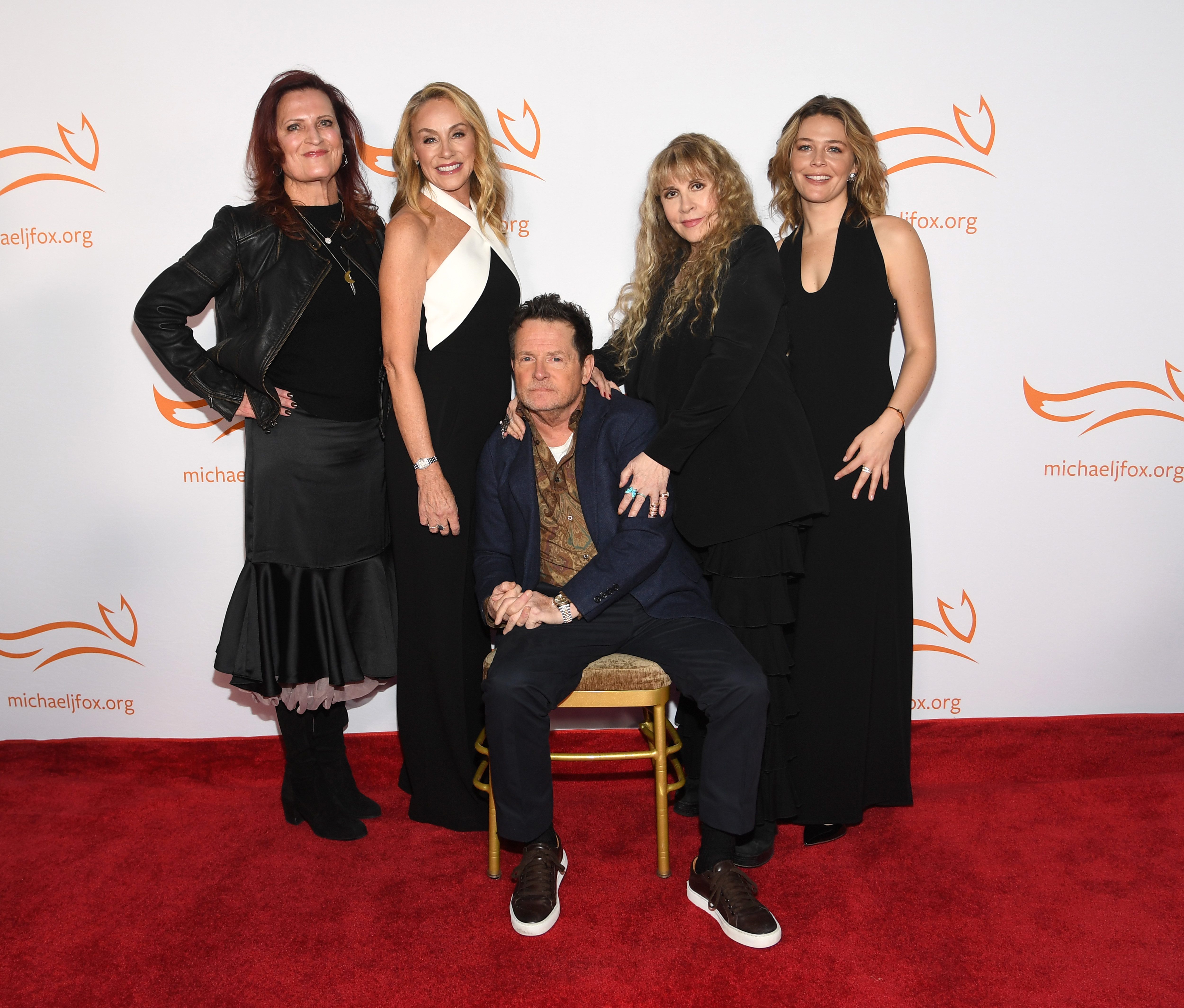 Photo taken by Noam Galai, provided by the Michael J. Fox Foundation. Left to right: Lisa Volenec, Tracy Pollan, Michael J. Fox, Stevie Nicks, Maggie Rogers.