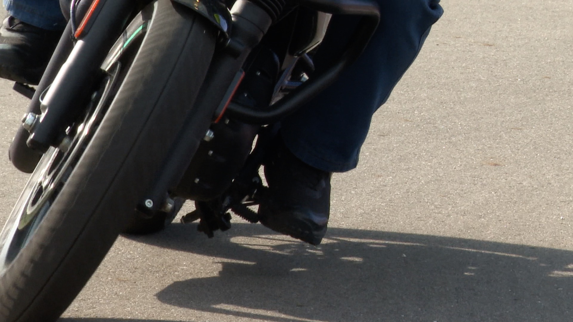 Instructor Rides Motorcycle