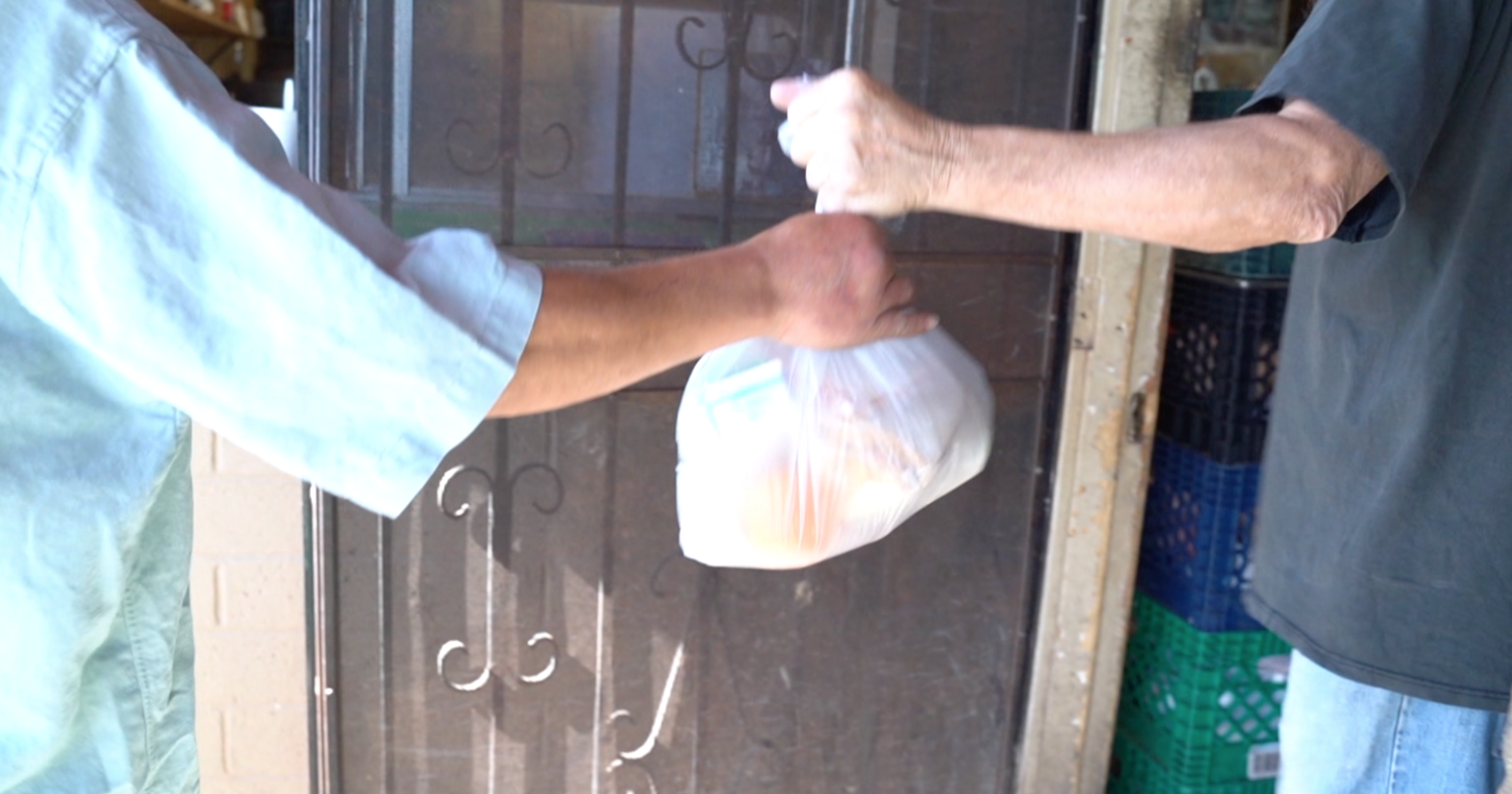 Brian Flagg giving out food