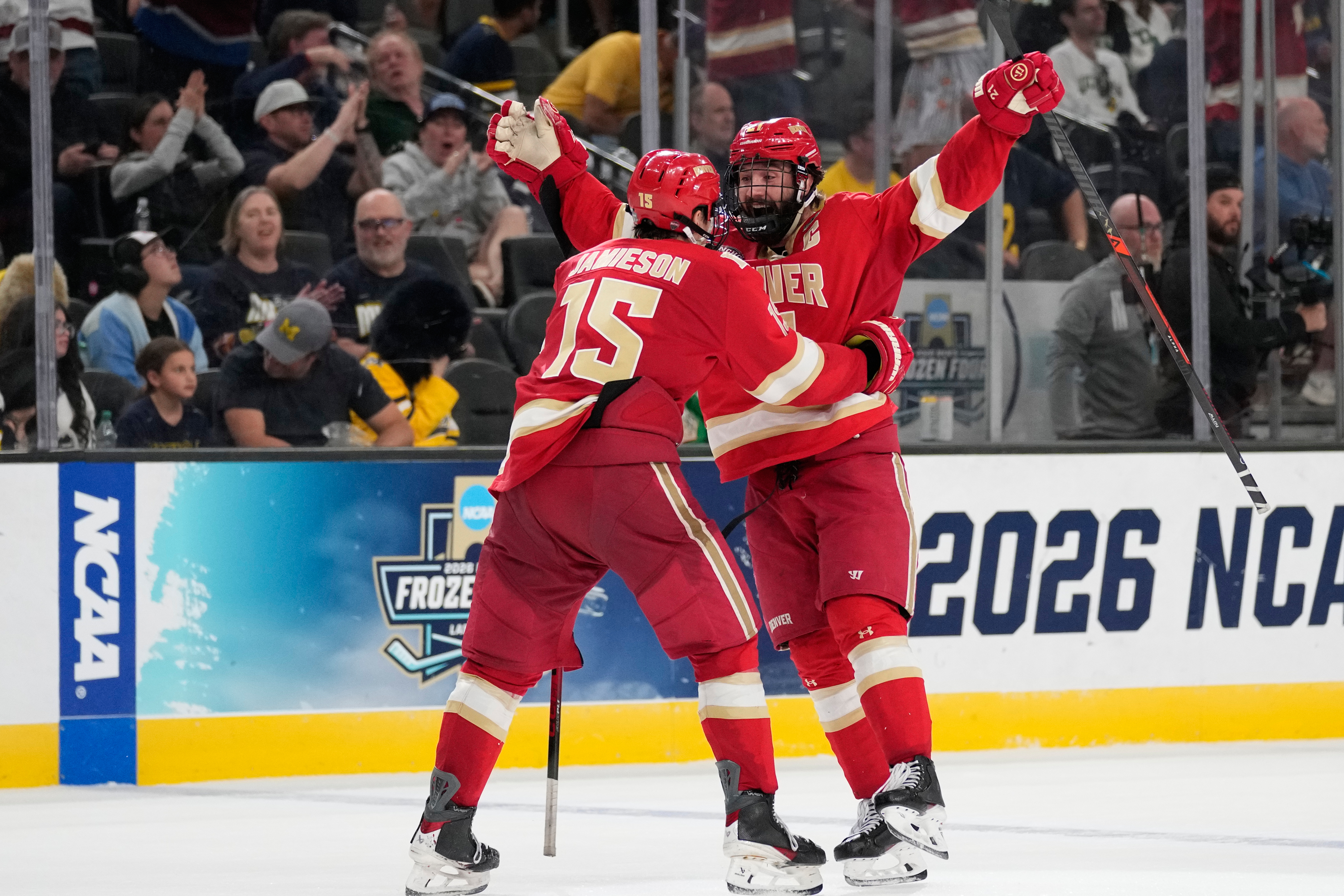 APTOPIX NCAA Michigan Denver Hockey