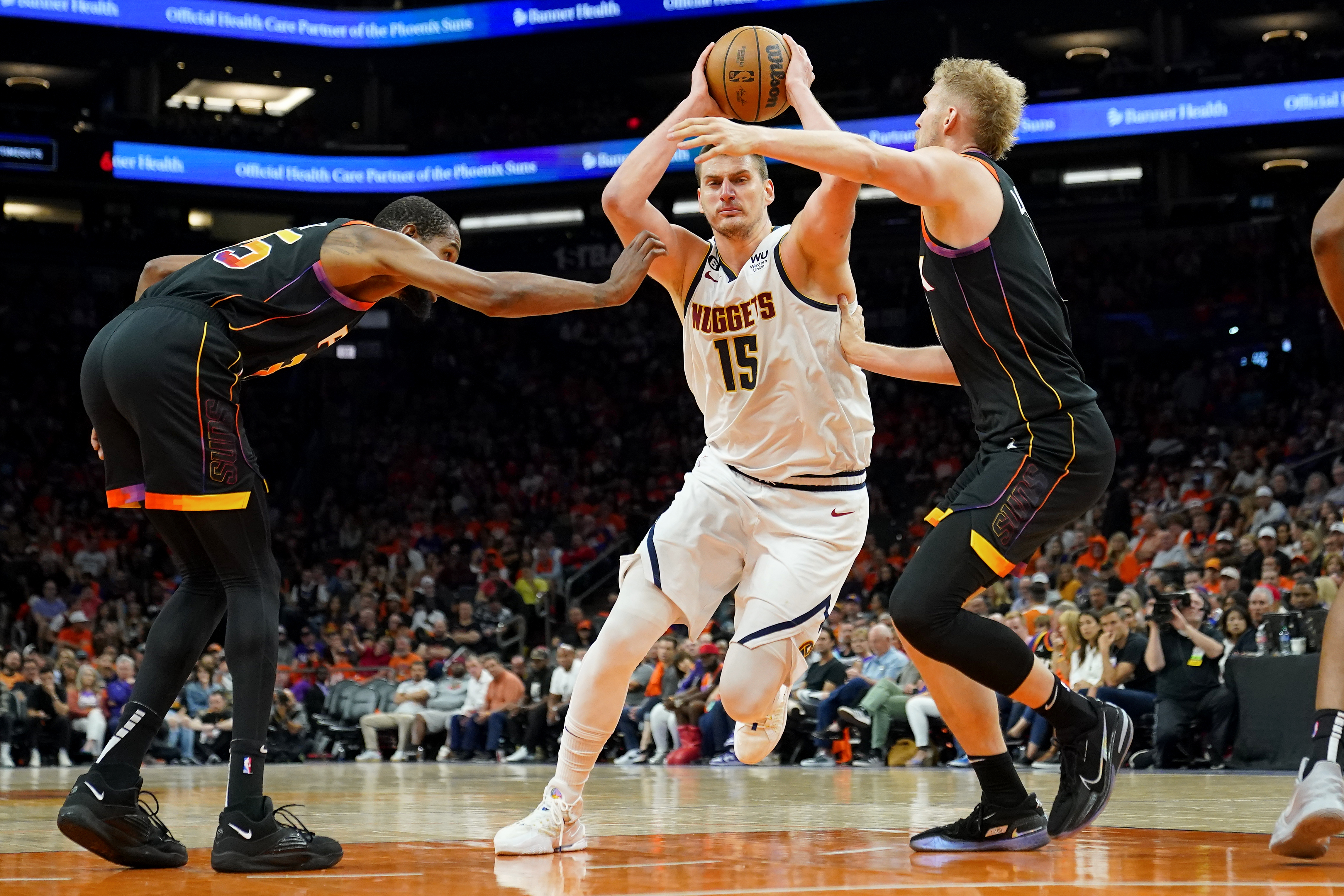 APTOPIX Nuggets Suns Basketball