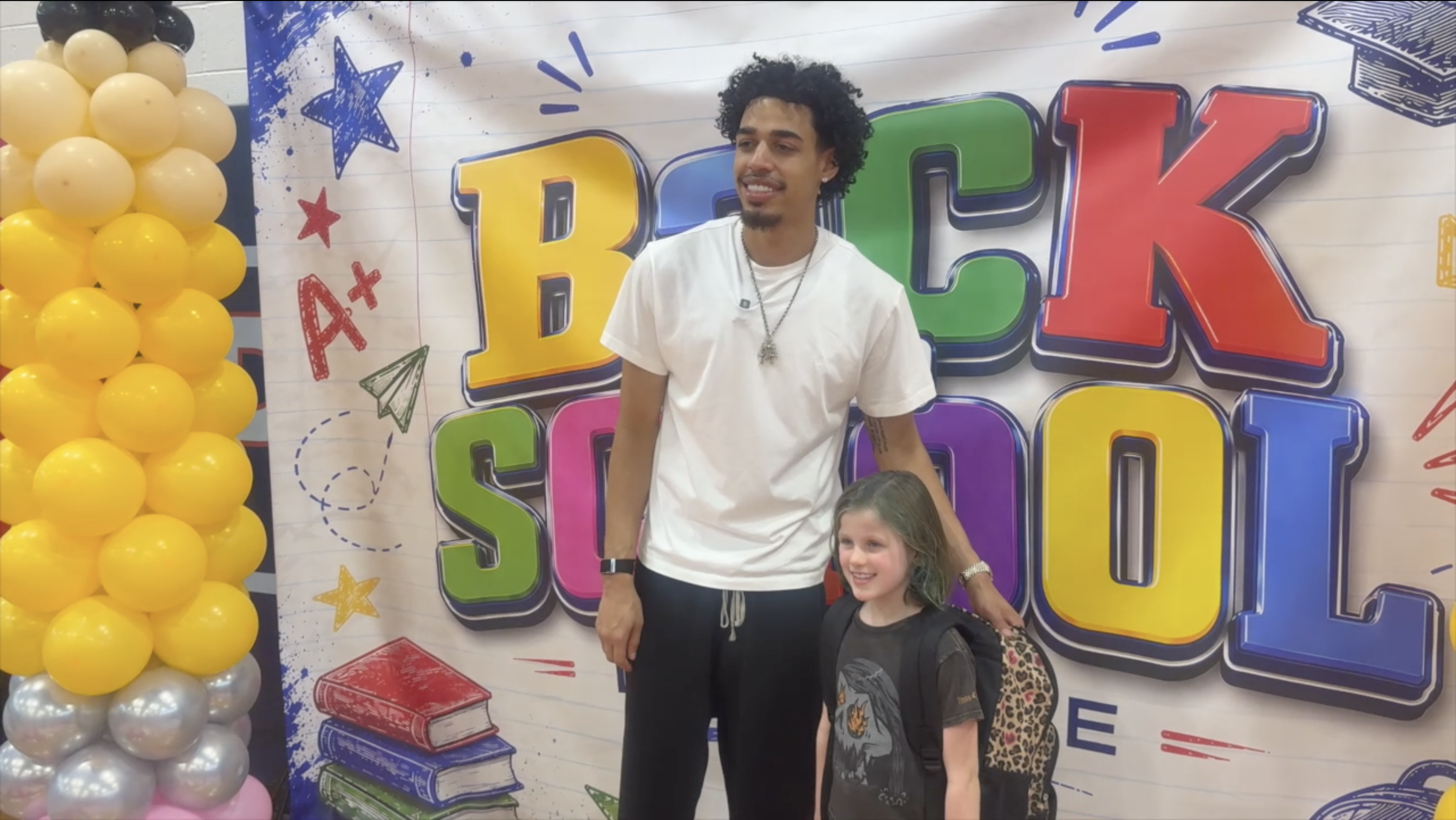 Julian Strawther backpack giveaway at Liberty High School