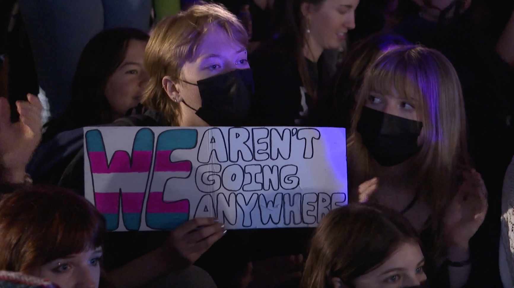 protester at queer dance rally.png