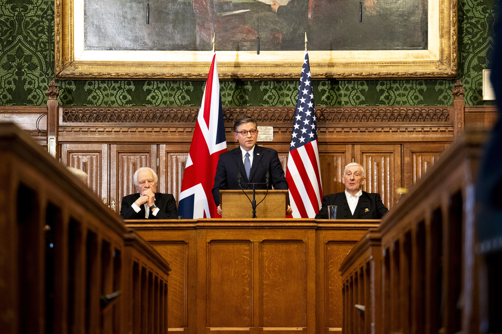 US House Speaker Mike Johnson addresses MPs in the House of Commons alongside Speaker of the House of Lords, Lord McFall, left, and Speaker of the House of Commons Sir Lindsay Hoyle, right, in Westminster, London.