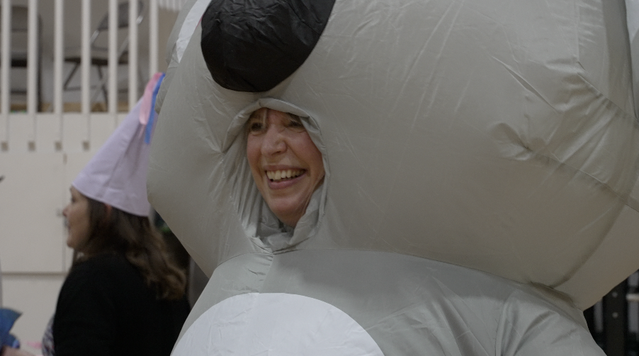 Staff and faculty participate in the inflatable costume race