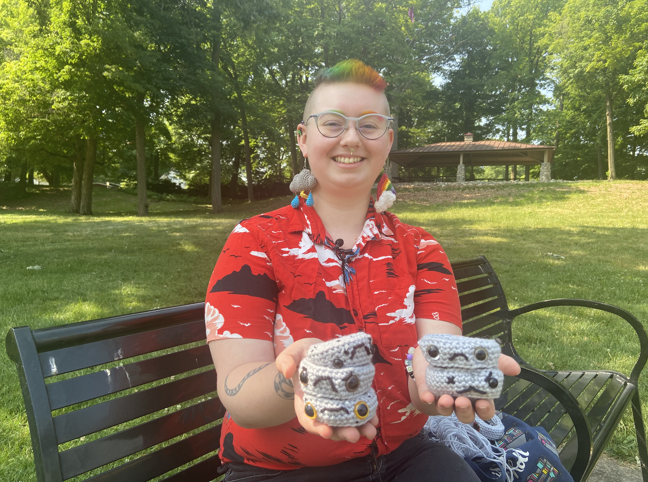 Amelia Herron holding her pothole creations