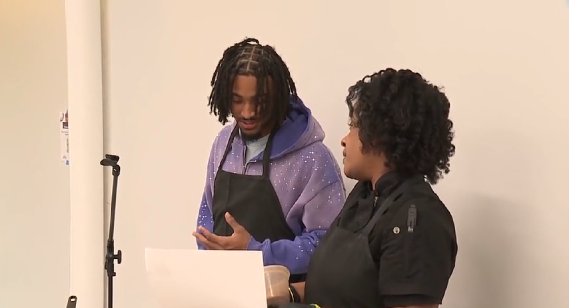 Ravens cornerback helps distribute fresh food to Baltimore families