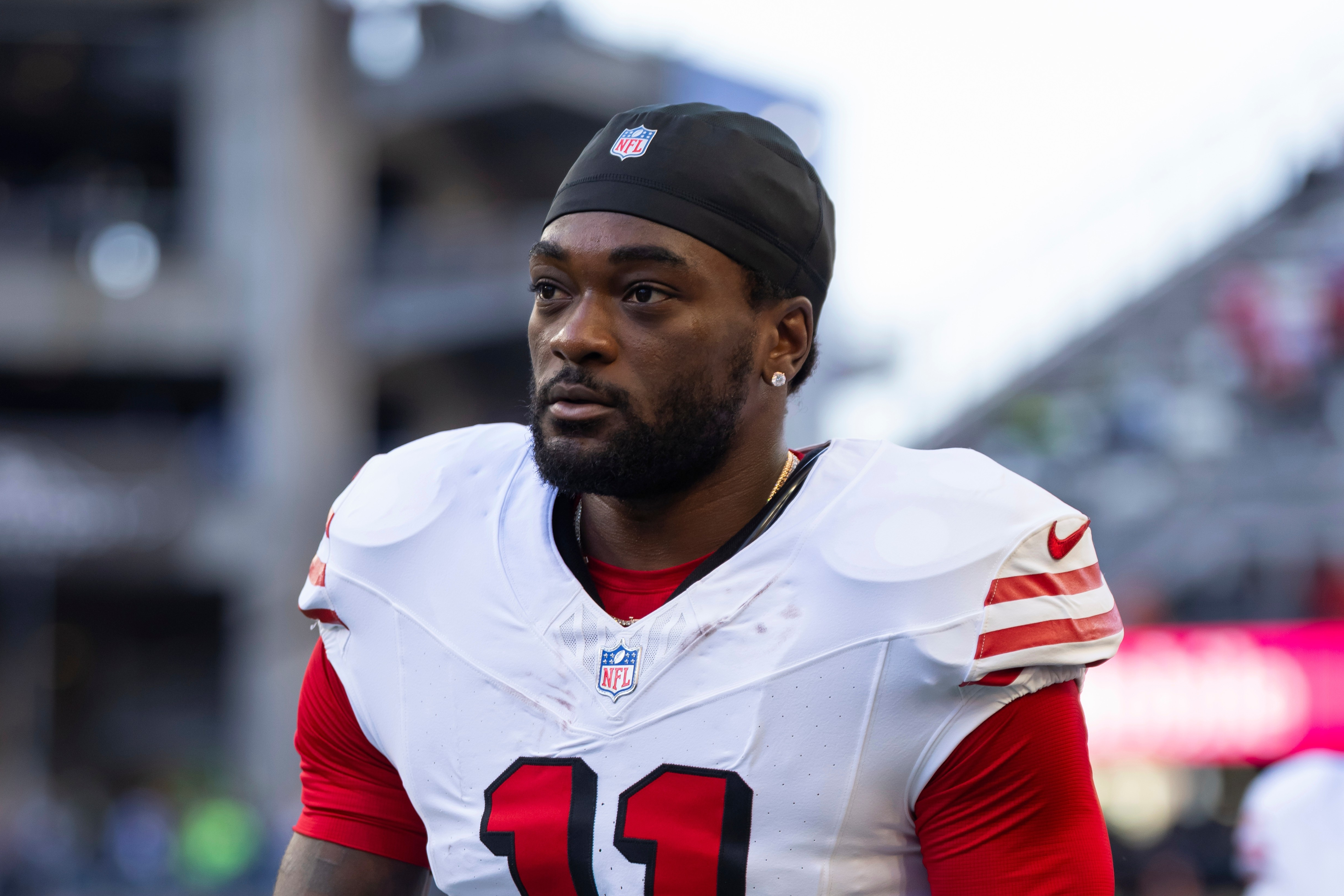 FILE - San Francisco 49ers wide receiver Brandon Aiyuk (11) walks of the field before an NFL football game against the Seattle Seahawks on Oct. 10, 2024 in Seattle.