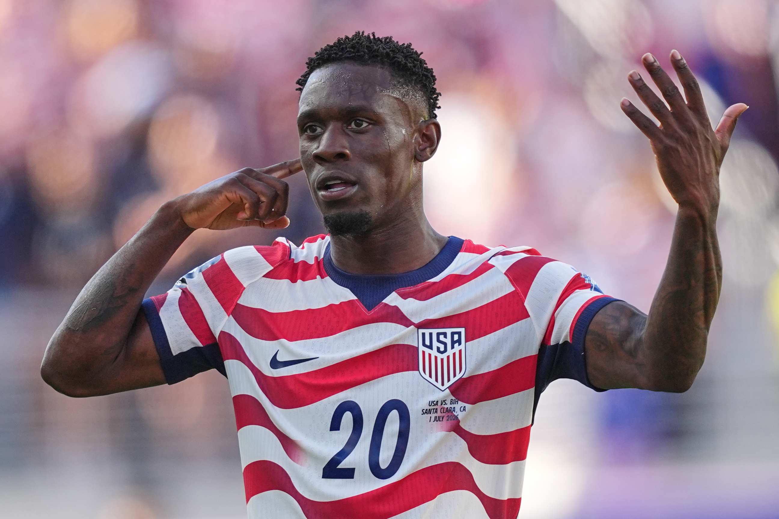 United States' Folarin Balogun (20) reacts after scoring his team's first goal during the World Cup round of 32 soccer match between the United States and Bosnia in Santa Clara, Calif., near San Francisco, Wednesday, July 1, 2026.
