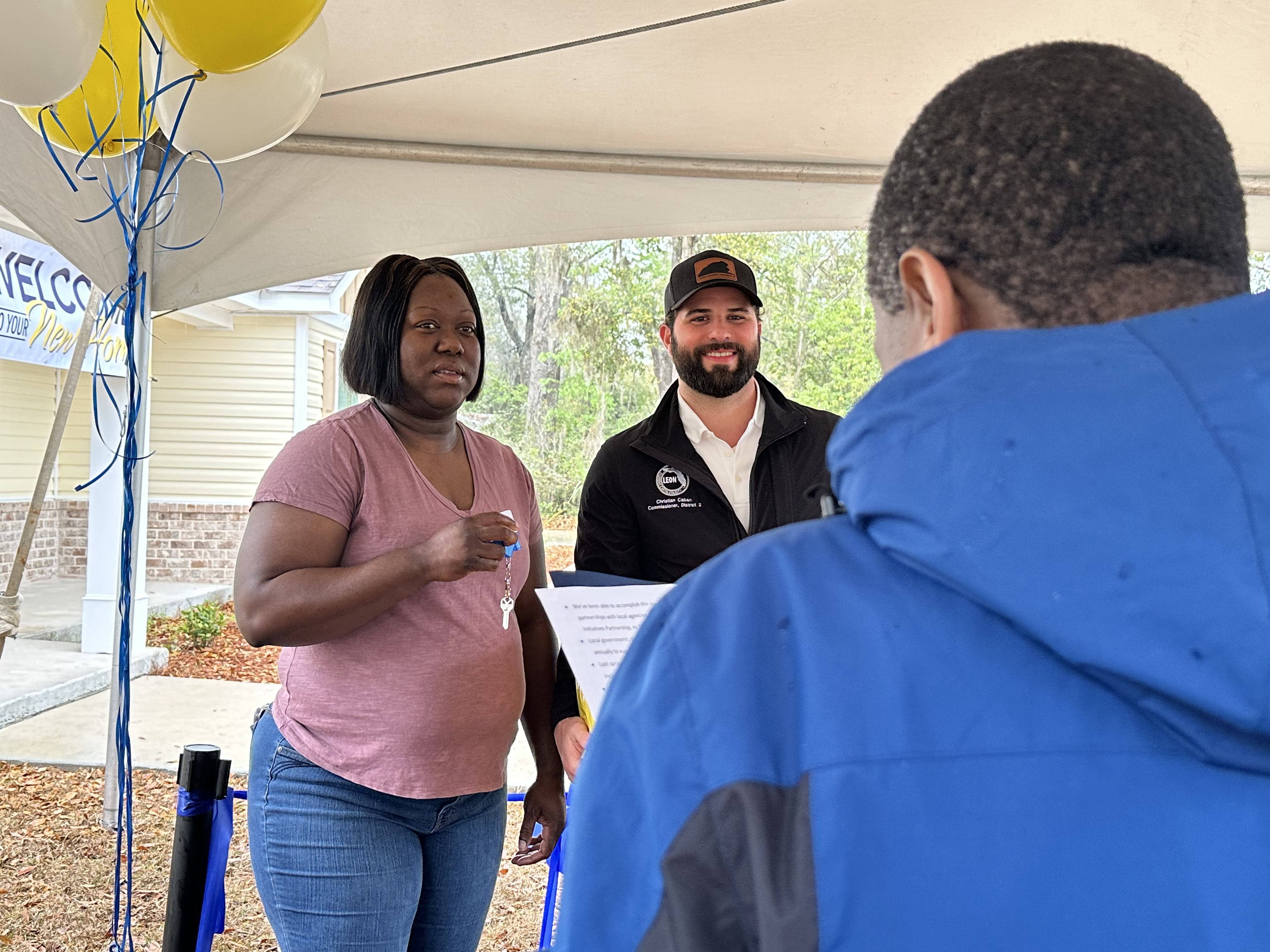 Homeowner gets key to house
