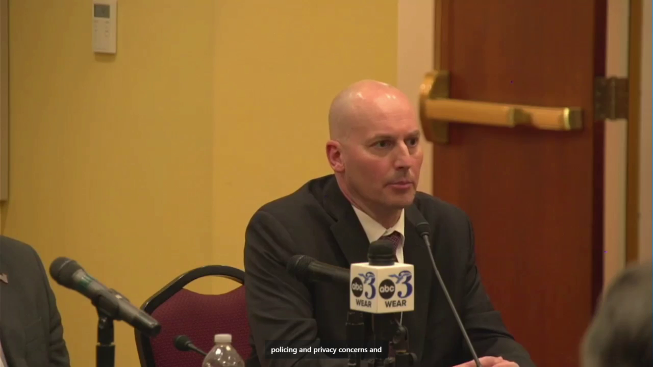 Chief Eric Winstrom takes part in a public forum in Pensacola