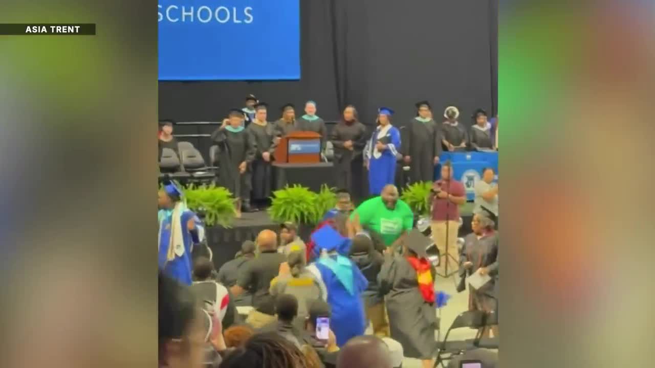 John Marshall graduation fight
