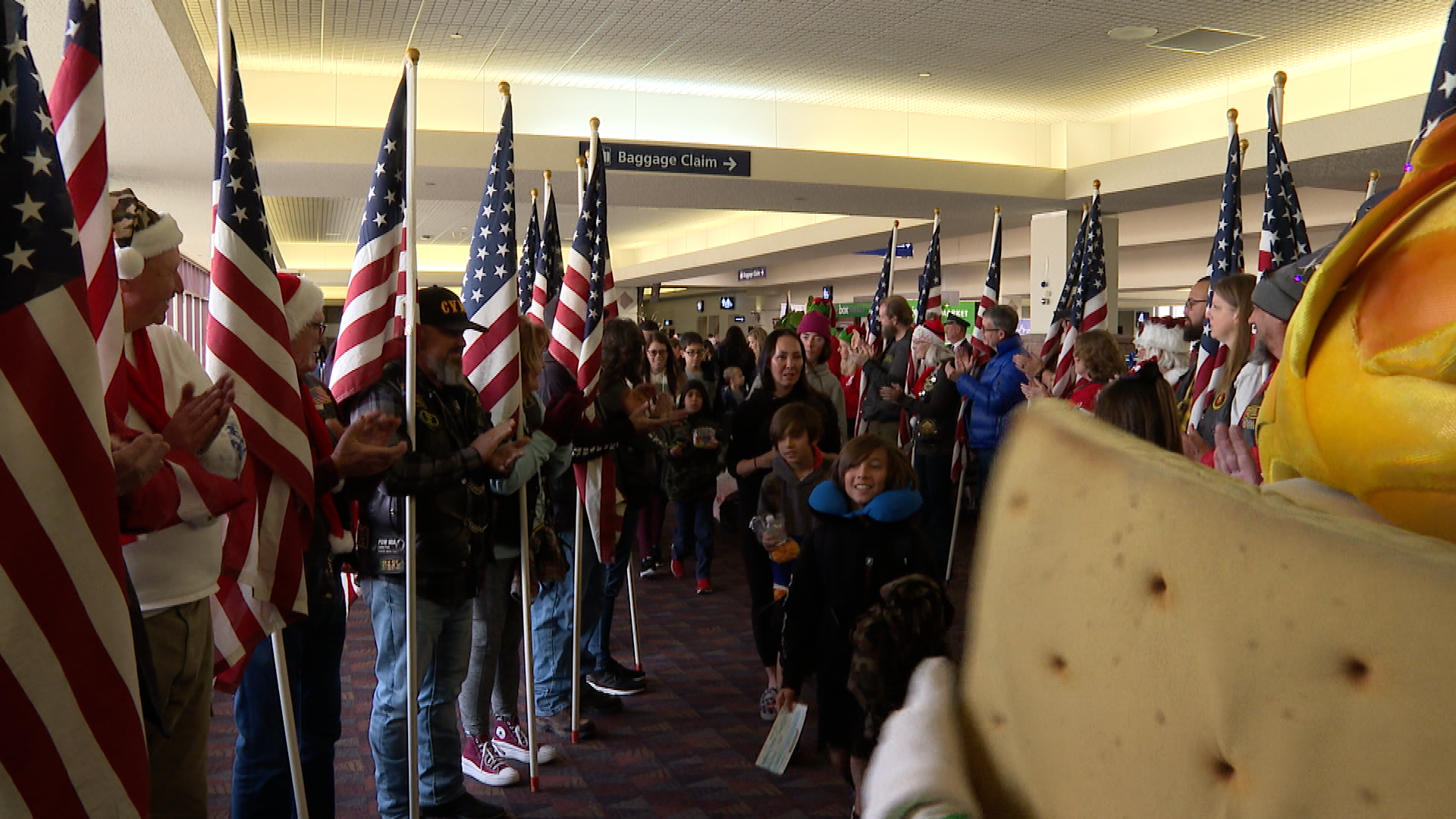 Snowball Express passengers leave for their trip to Disneyworld 