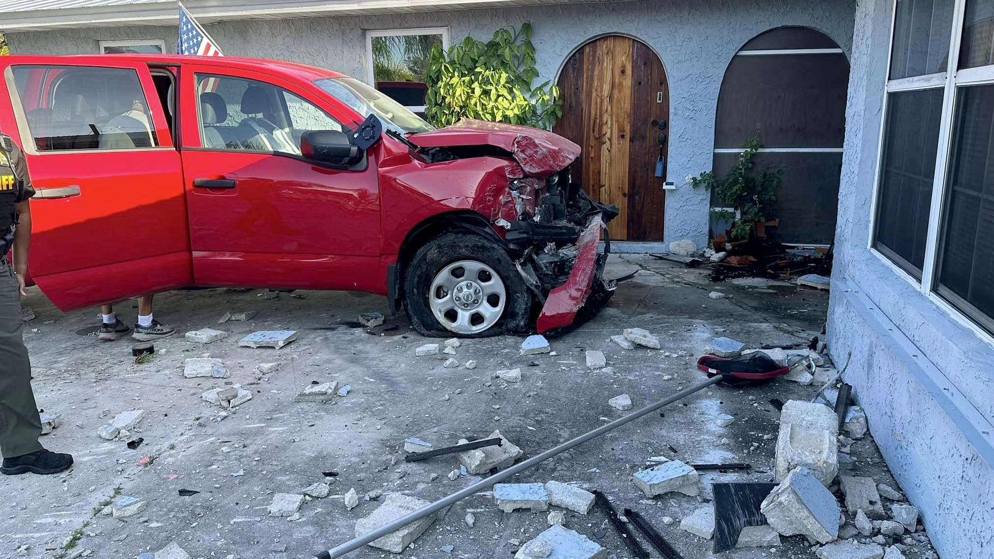 A Martin County woman and her dog escaped injury on Aug. 11, 2023, after the driver of a pickup truck lost control of his vehicle and crashed into a home. 