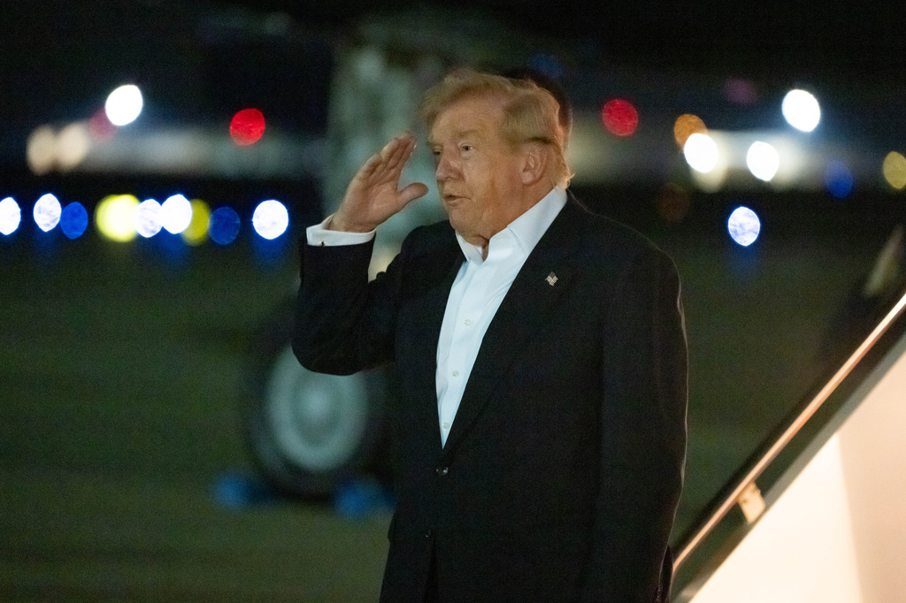 President Donald Trump salutes as he arrives on Air Force One, Thursday, July 9, 2026, at Joint Base Andrews, Md. 