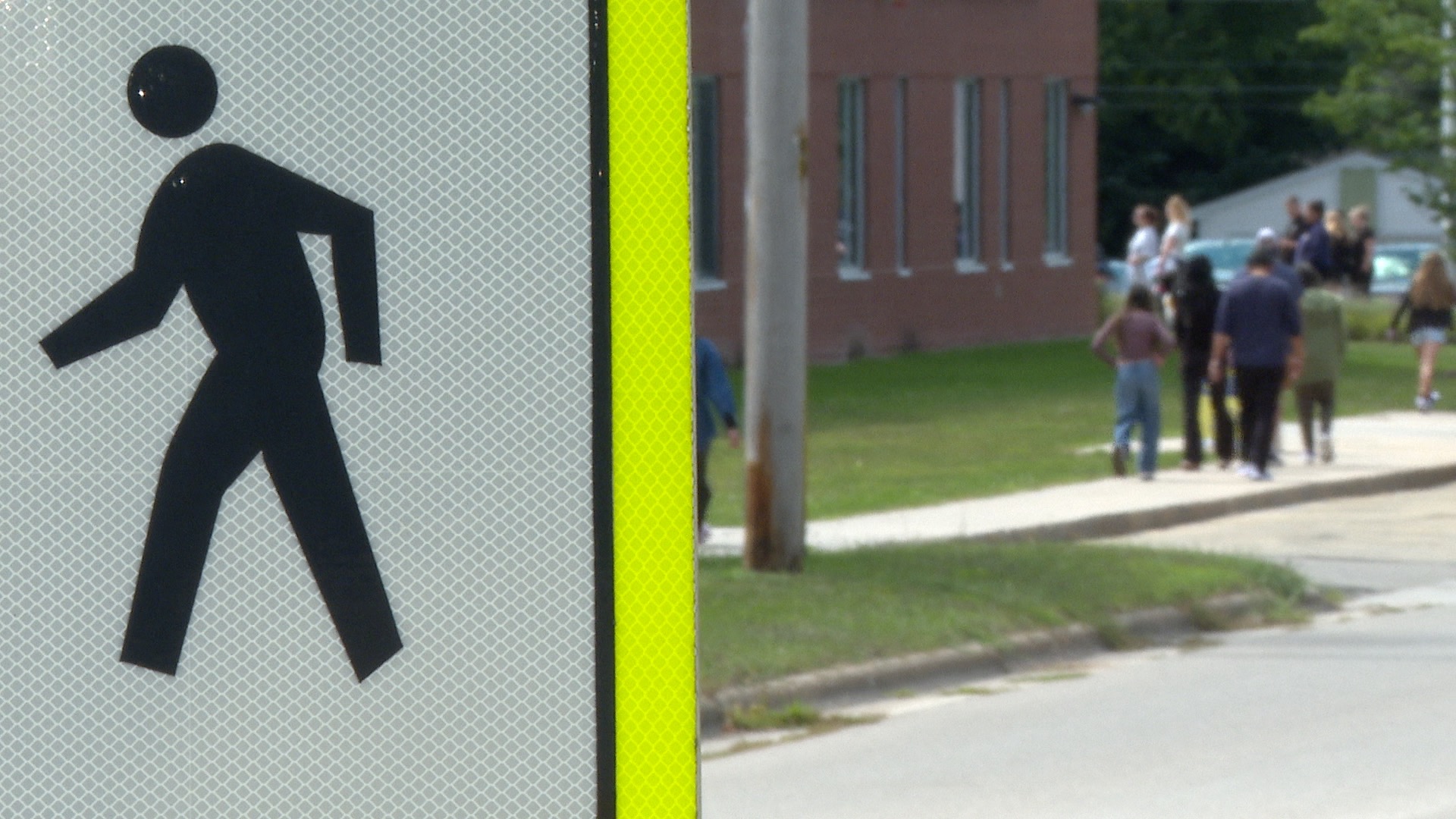 Pedestrian Sign Close up at Holbrook Elementary in Grand Ledge