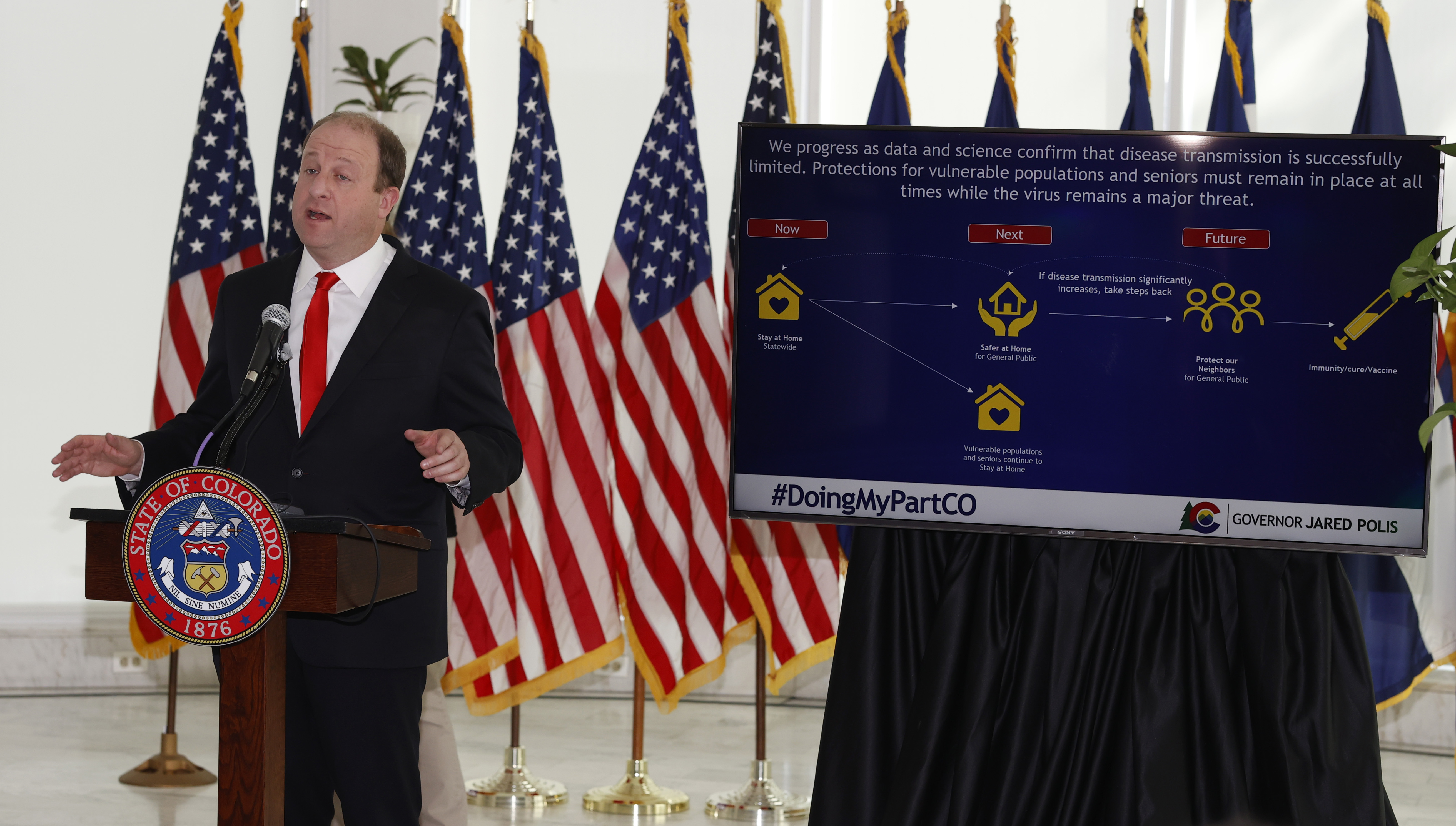 jared polis safer at home colorado coronavirus covid-19