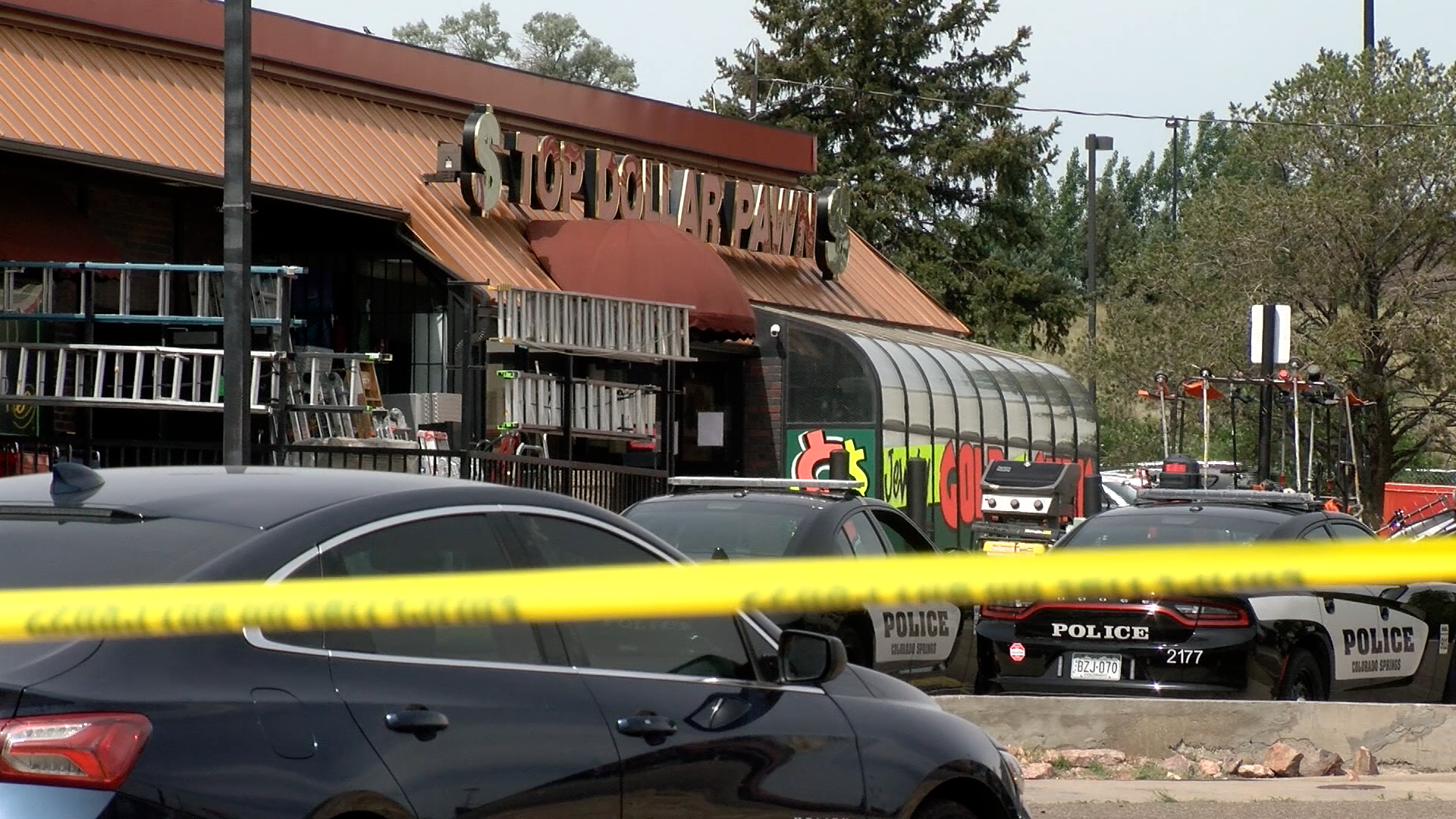 Multiple agencies, including the FBI, raided multiple Top Dollar Pawn shops in southern Colorado.