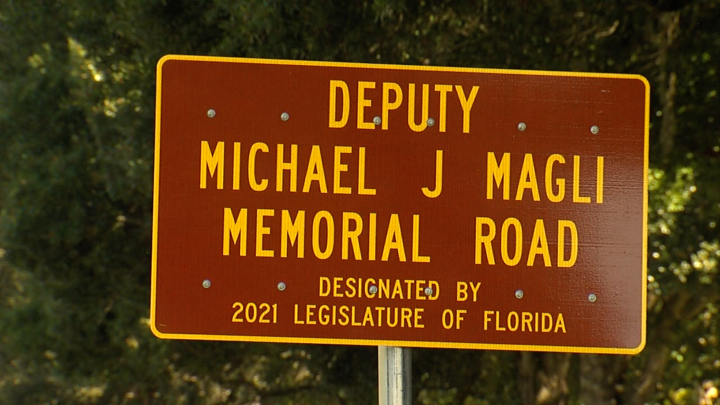 deputy_michael_magli_road_dedication_720.png