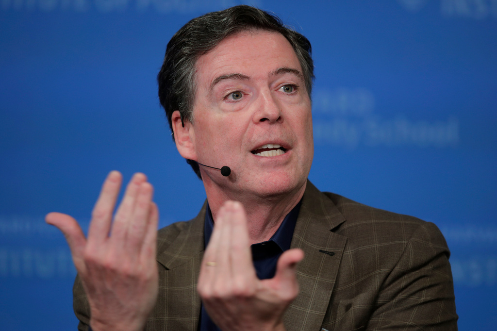 FILE - Former Director of the Federal Bureau of Investigation James Comey at Harvard University's Institute of Politics' JFK Jr. Forum in Cambridge, Mass., Feb. 24, 2020. 