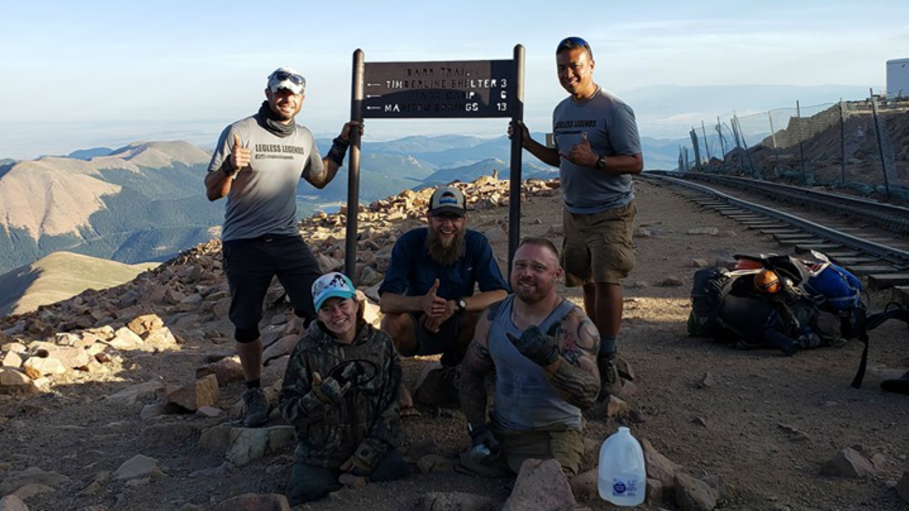 Mandy and Travis top Pikes Peak summit.jpg