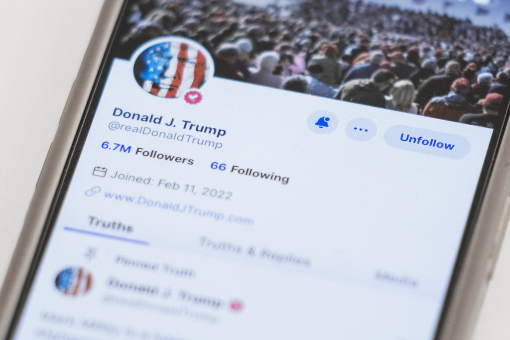 FILE - The Truth Social account for former President Donald Trump is seen on a mobile device, March 20, 2024, in New York.