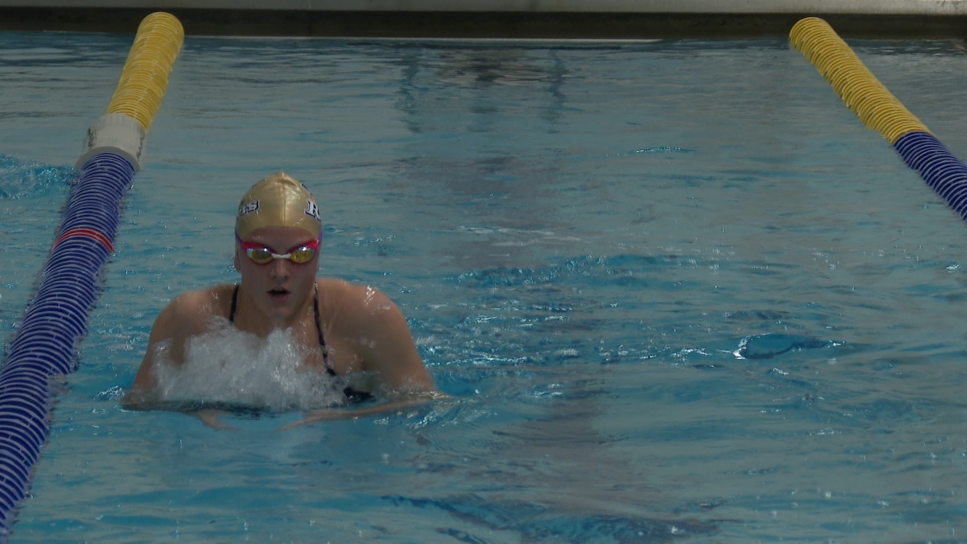 Brownell-Talbot freshman Millie Knudson swims breaststroke at practice in October 2025