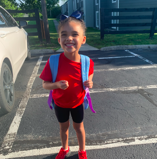 Kid with backpack.png