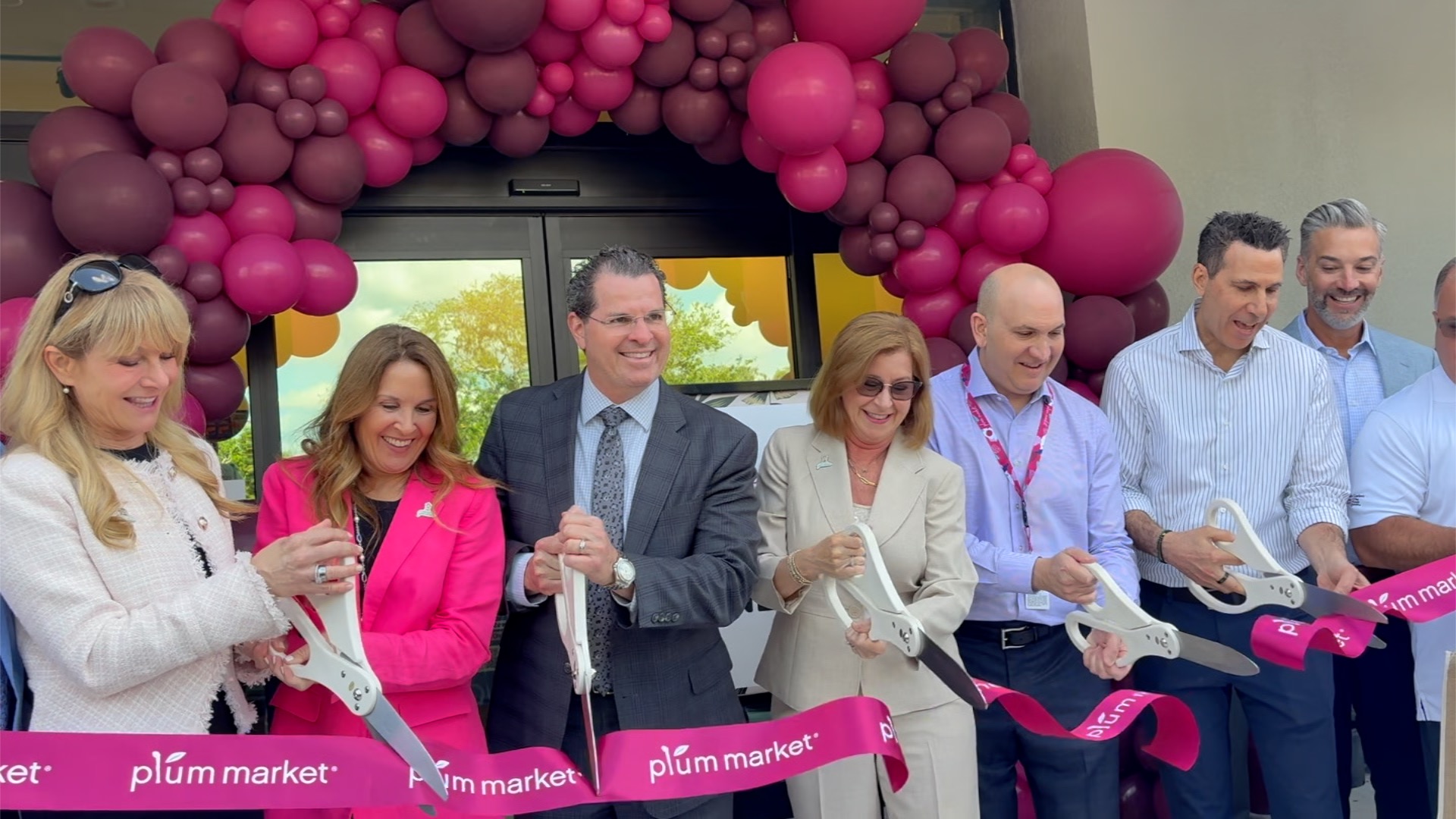 Ribbon Cutting Plum Market