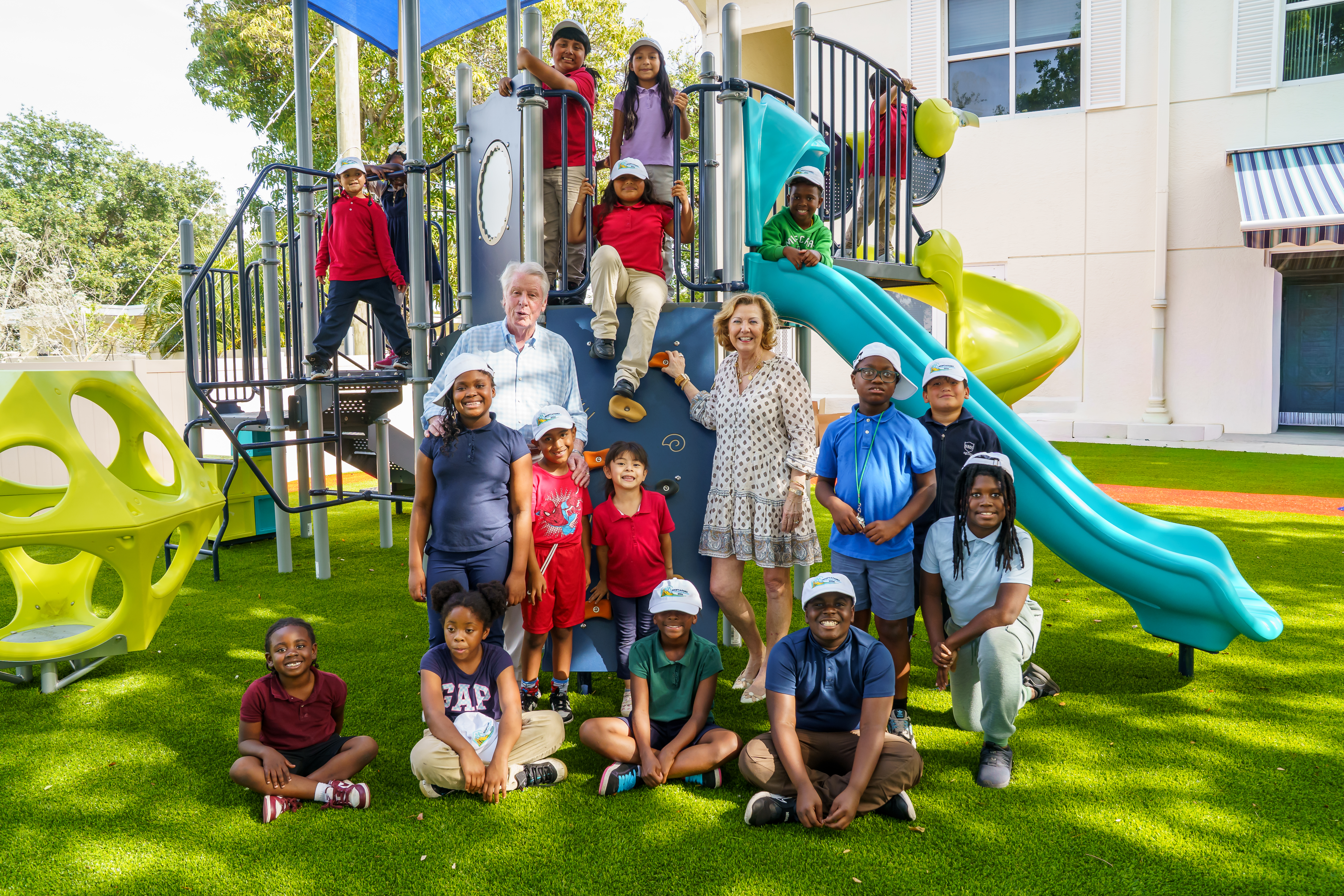 Tim and Jayne Donahue with kids in AAF's Project Grow program .jpg