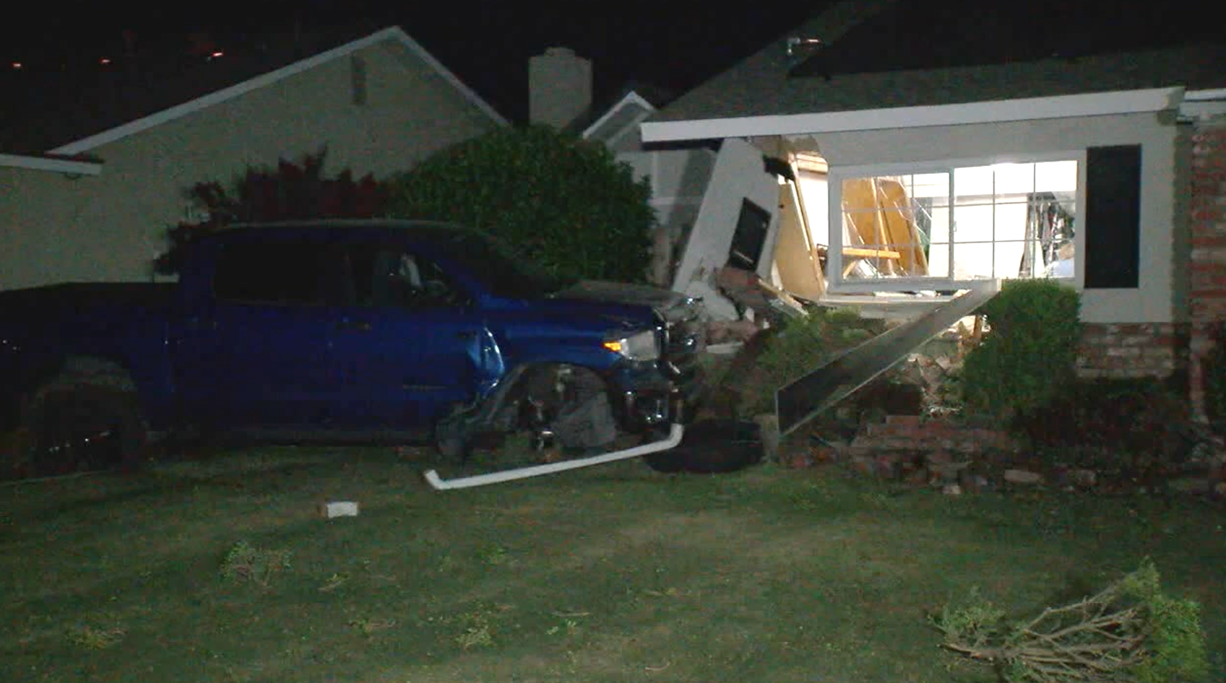 truck hits house in bakersfield