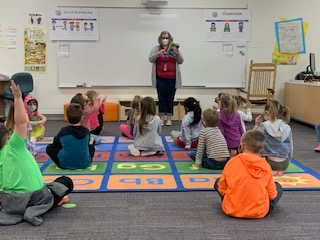 Mason students selecting their summer reading books as part of 'Kids Read Now' summer program.