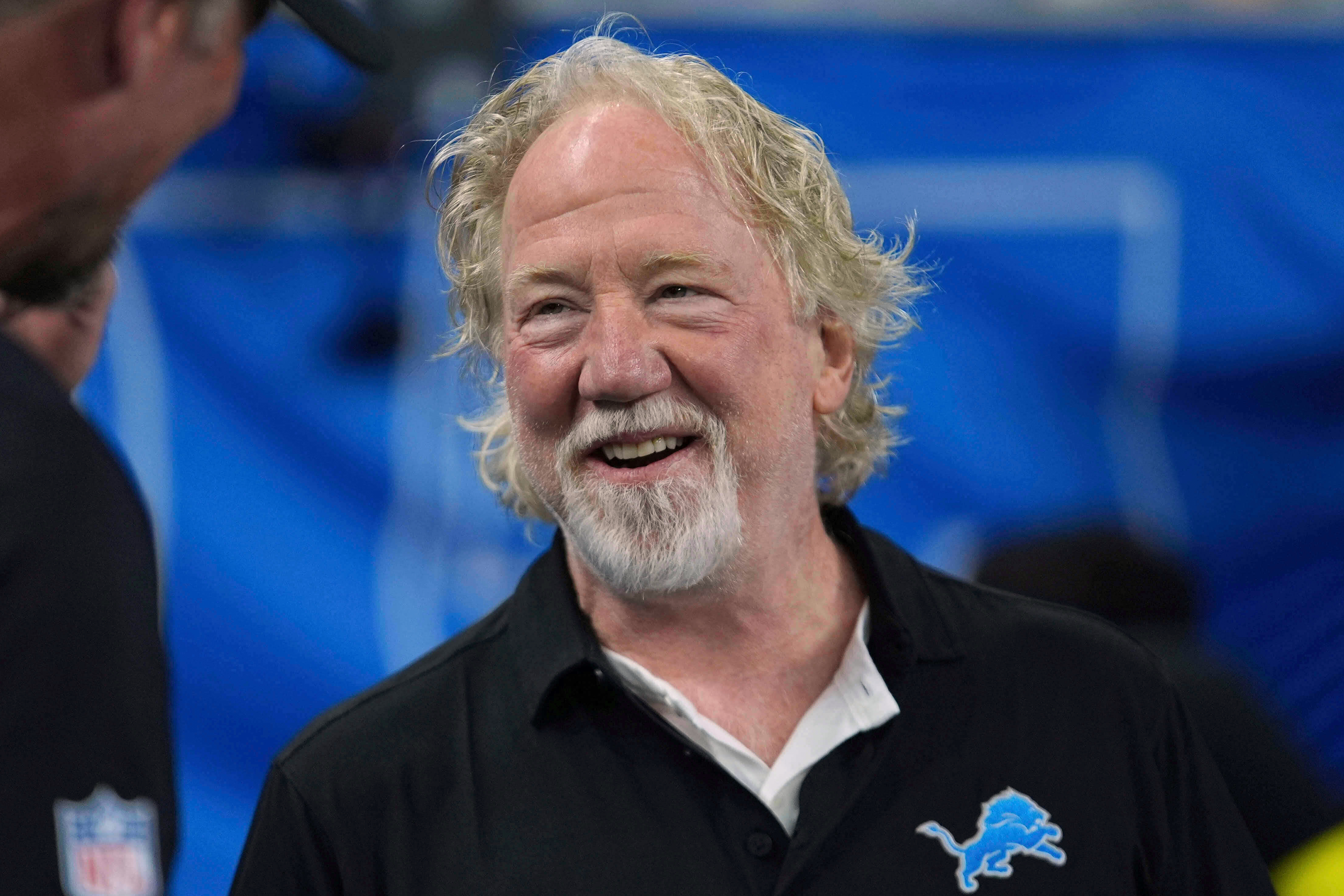FILE - Actor Timothy Busfield smiles before an NFL football game in Detroit, Sept. 14, 2025.