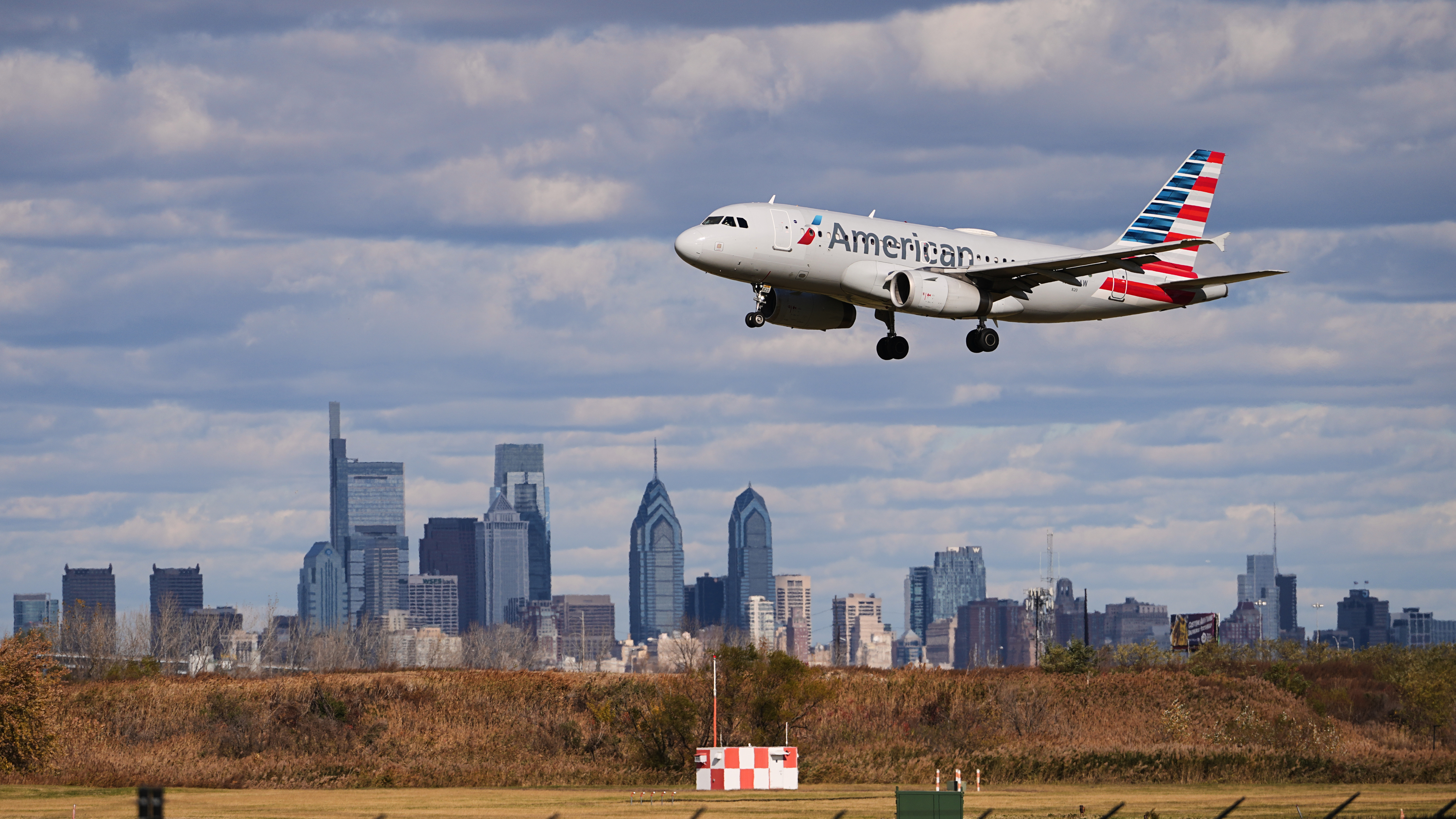 FILE - An aircraft lands at Philadelphia International Airport in Philadelphia, Nov. 6, 2025. 