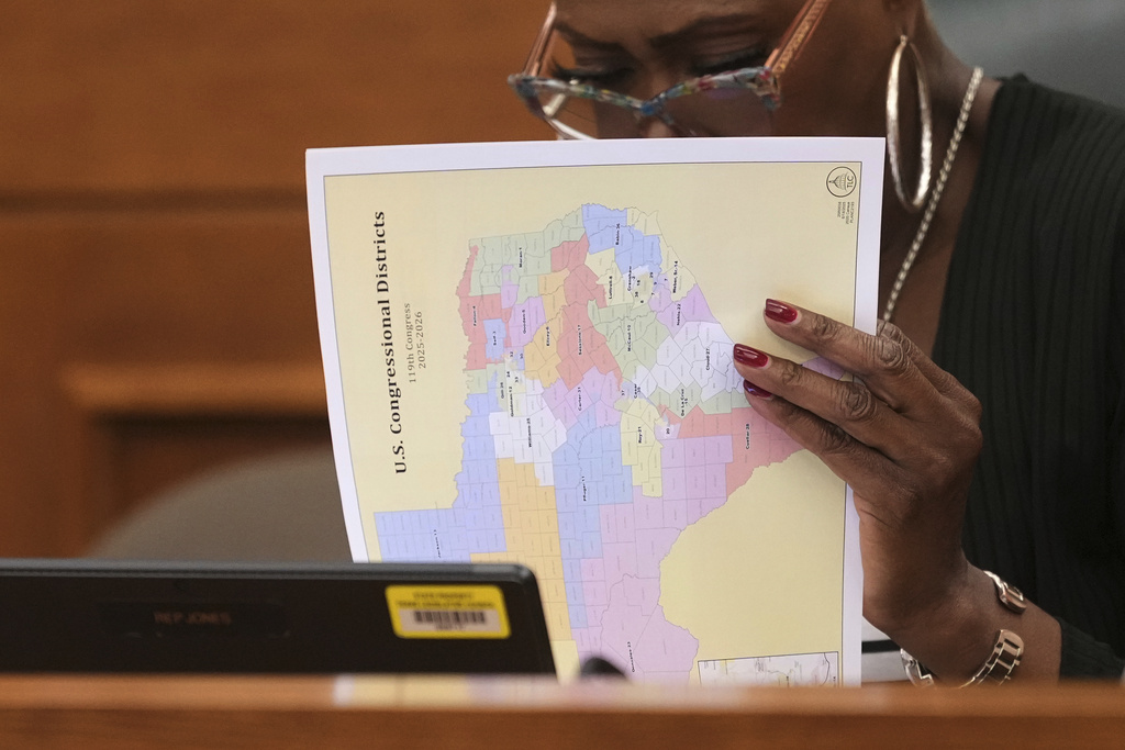 Texas state Rep. Jolanda "Jo" Jones looks through U.S. Congressional District maps during a redistricting hearing at the Texas Capitol.