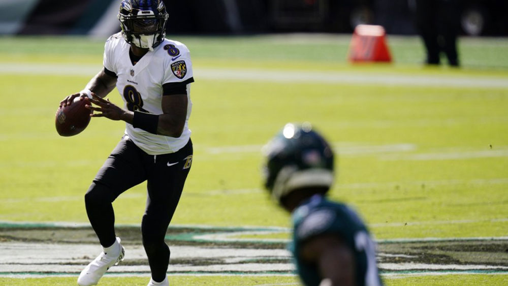 Ravens hold on for 30-28 win over depleted Eagles.jpg