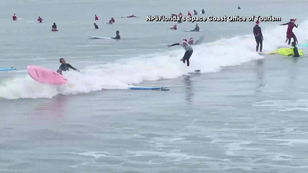 wptv-surfing-santas.jpg