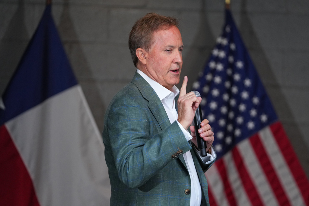 Texas Attorney General Ken Paxton, a Republican candidate for the U.S. Senate, speaks to supporters while campaigning for his primary runoff race Monday, May 18, 2026, in Dallas.