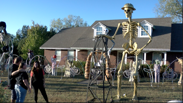 "WE'RE KIDS AT HEART": Oklahoma couple draws crowds with elaborate Halloween display