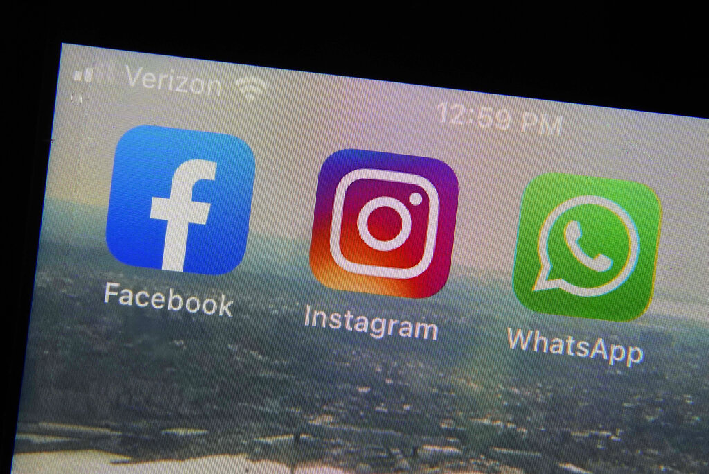Mobile phone app logos for, from left, Facebook, Instagram and WhatsApp.