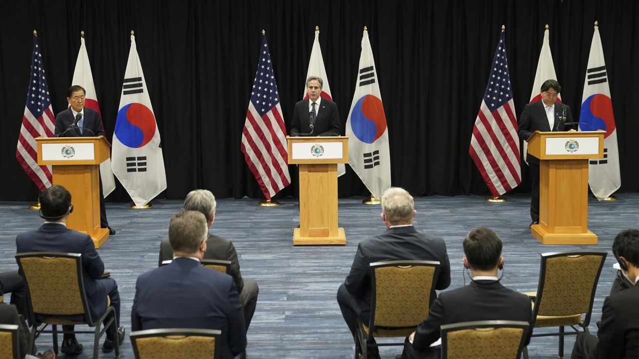 U.S. Antony Blinken with South Korea's Chung Eui-yong and Japan's Yoshimasa Hayashi.