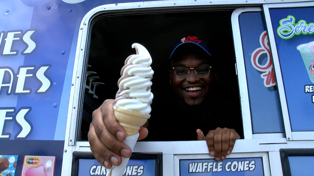 Jon Boyd holding ice cream cone