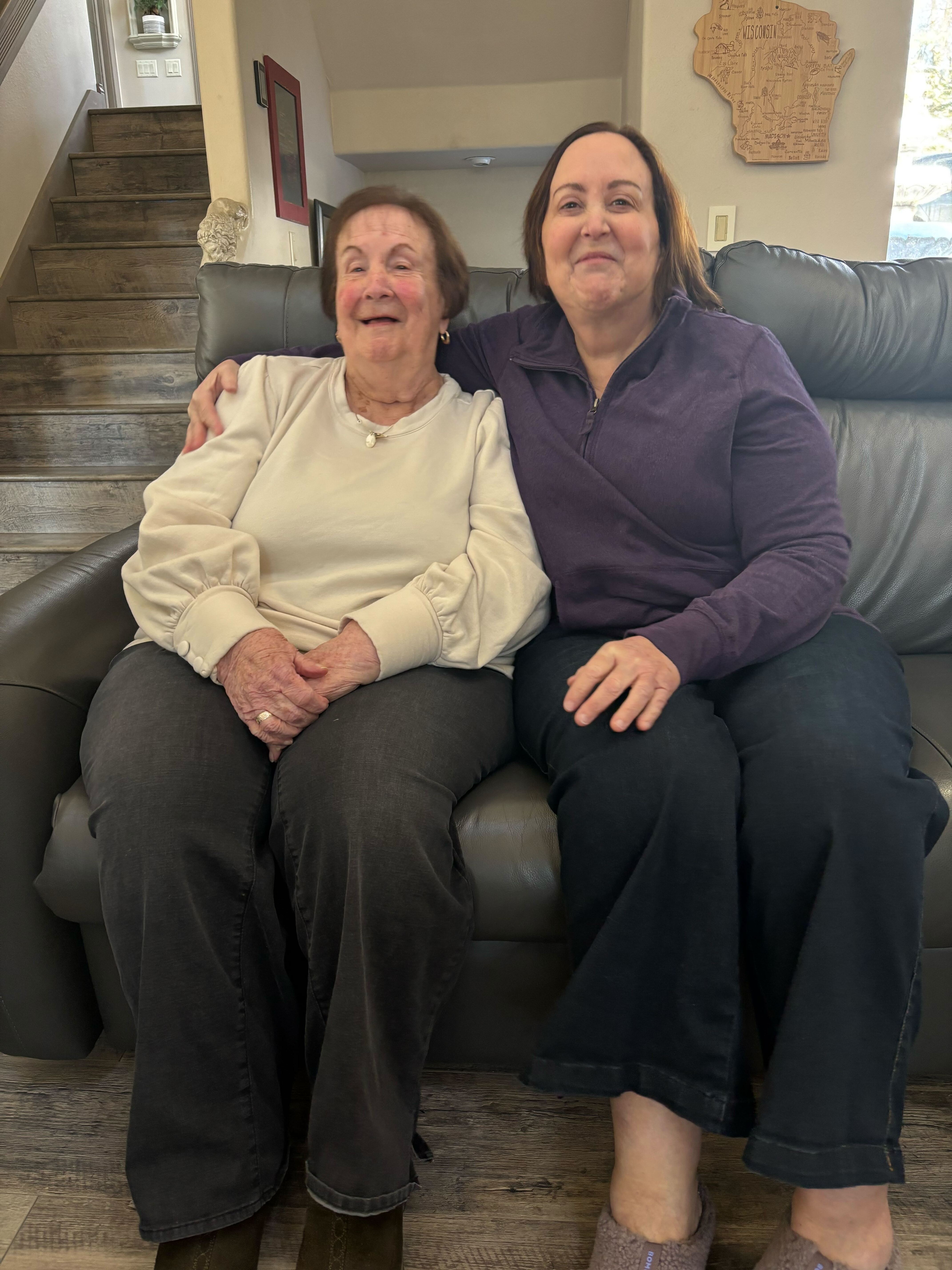 Rather than a long term care facility, Mary Ann Hack and daughter Kathy Hack moved in together along with seven other extended family members in a West Bend mansion.