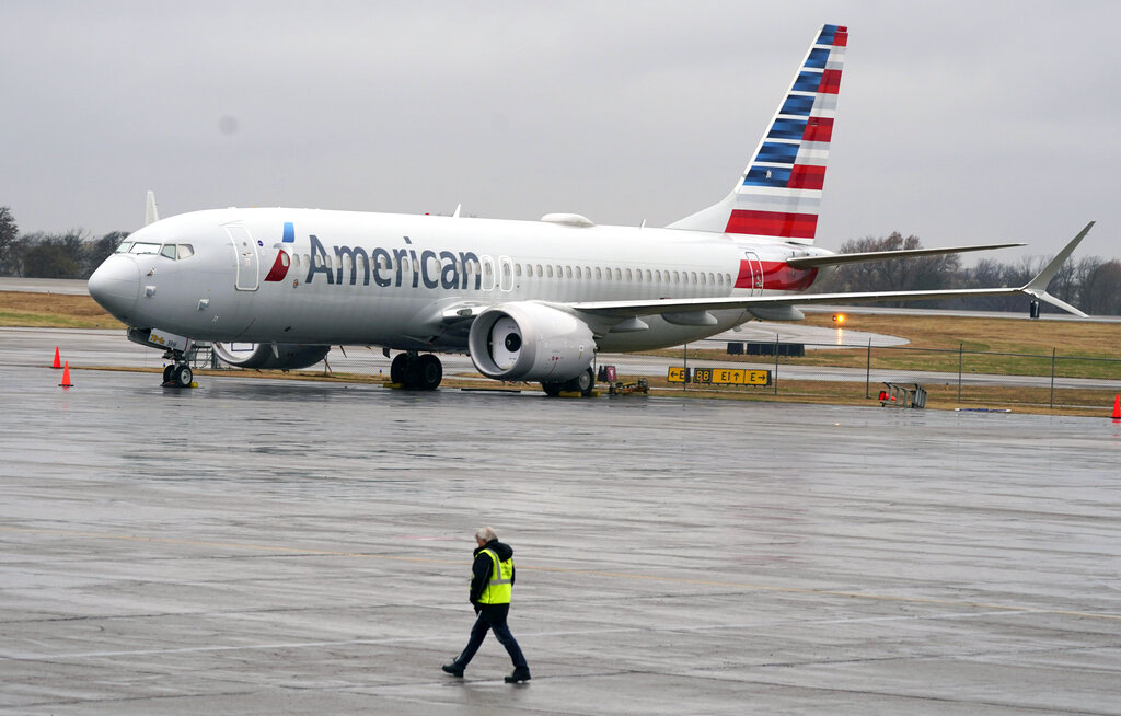 FILE - An American Airlines Boeing 737 Max jet plane is parked at a maintenance facility in Tulsa, Okla.