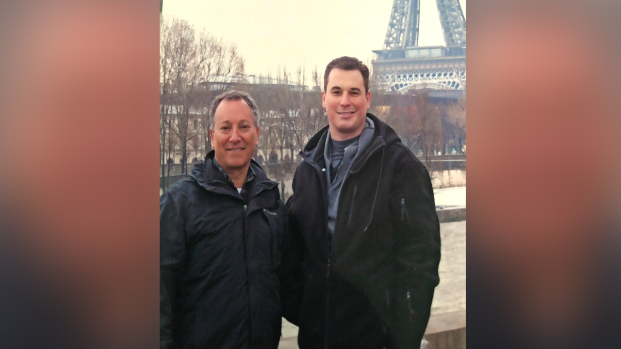 In this undated photo made available by the Modell family, Ryan Modell, right, visits Paris with his father Sandy Modell. Sandy Modell is asking Florida Gov. Ron DeSantis to reopen the investigation into his son's 2016 shooting death during an altercation at Ryan Modell's Fort Myers, Fla., condominium complex.