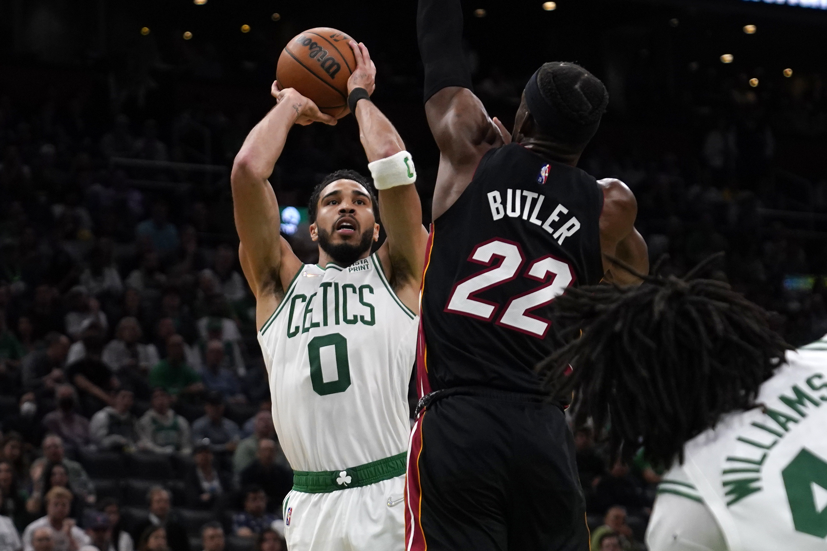 Boston Celtics forward Jayson Tatum shoots over Miami Heat forward Jimmy Butler, May 23, 2022